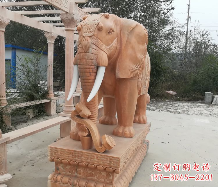 泉州鼻卷如意的大象晚霞红门口镇宅石雕