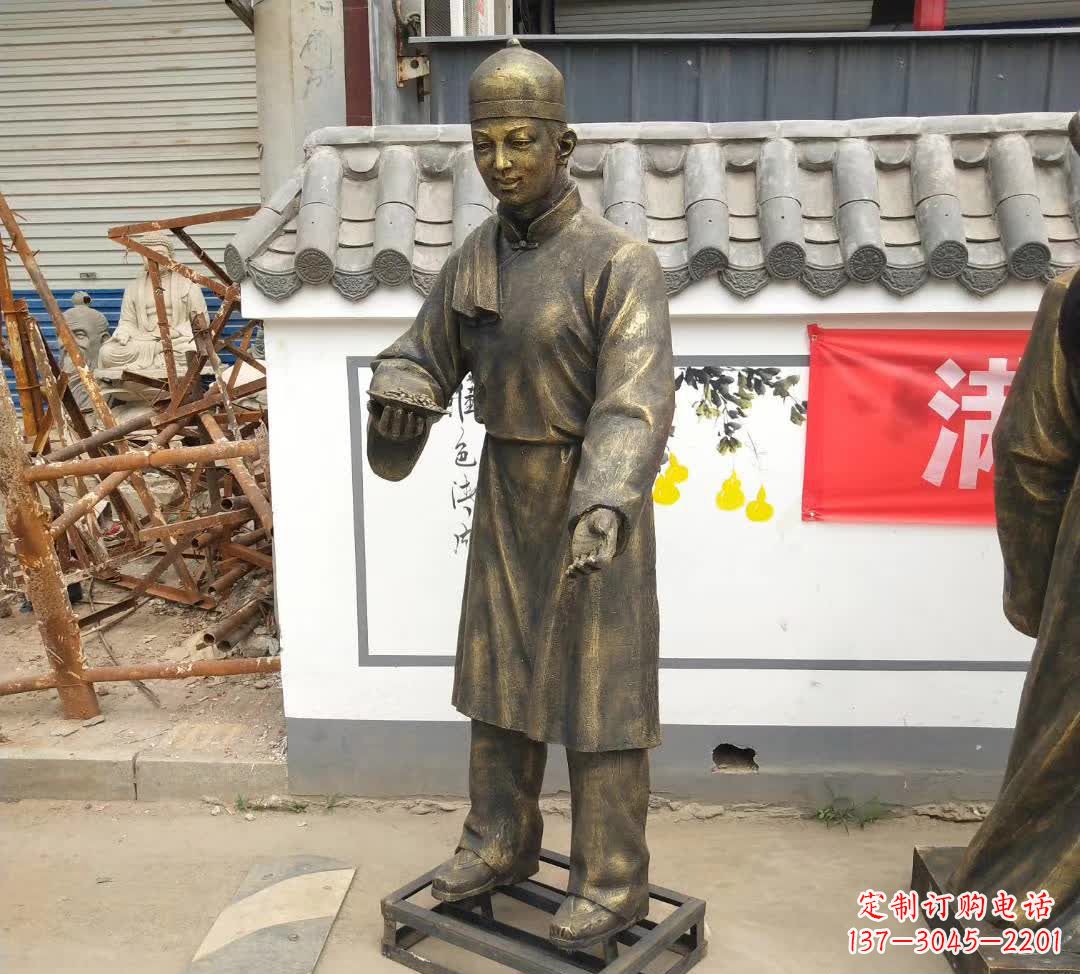 泉州步行街店小二人物铜雕