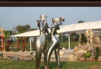 泉州一对动感传情的不锈钢跳舞情侣雕塑