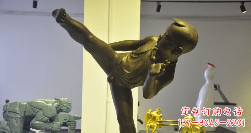 泉州领雕塑男孩练功夫铜雕