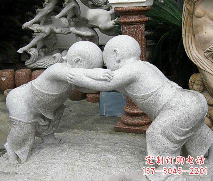 泉州可爱小孩摔跤石雕