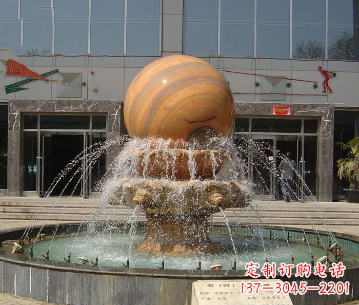 泉州石来运转球晚霞红风水球石雕