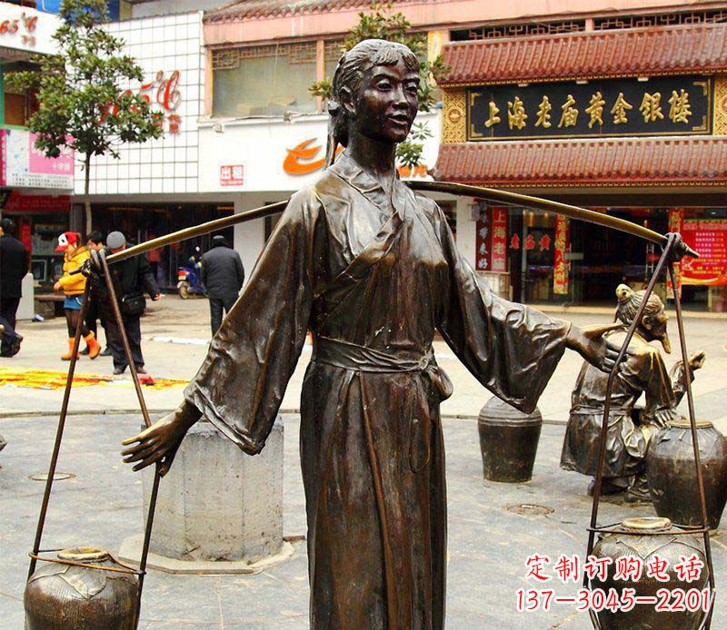 泉州挑着罐子的古代女人铜雕