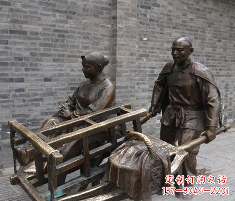 泉州推独轮车的人物铜雕