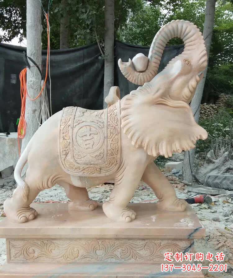 泉州晚霞红卷元宝大象雕塑