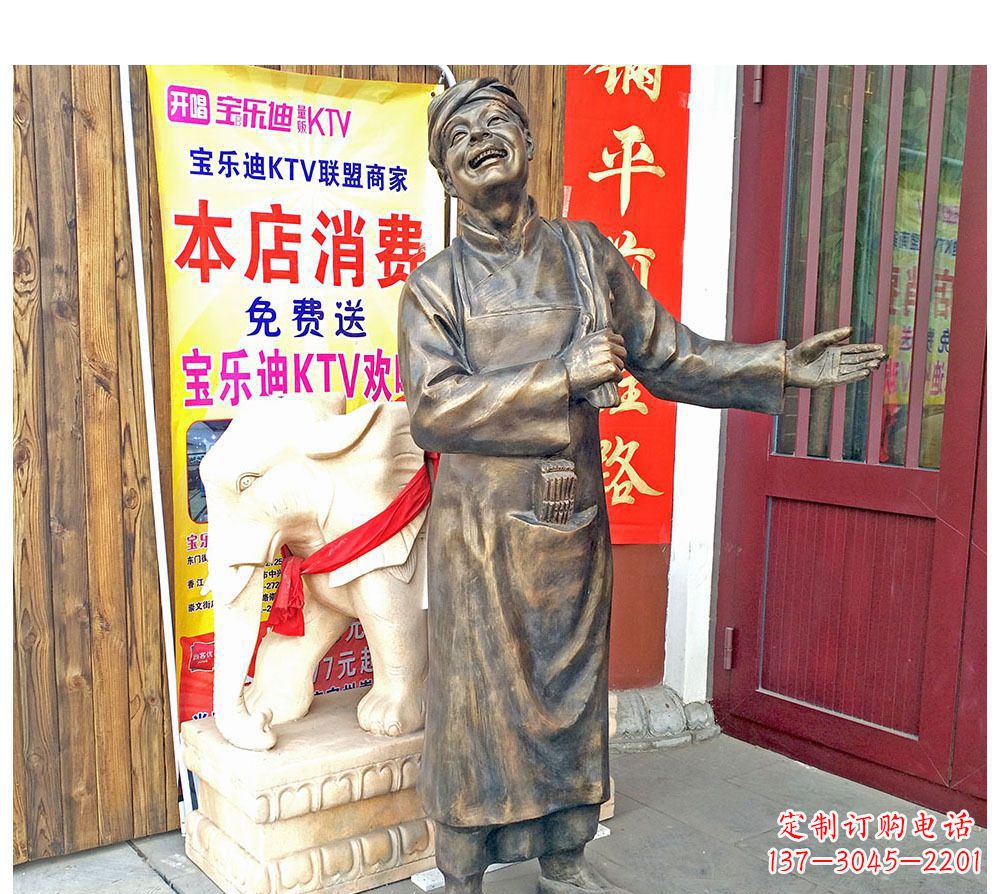 泉州迎宾的店小二铜雕