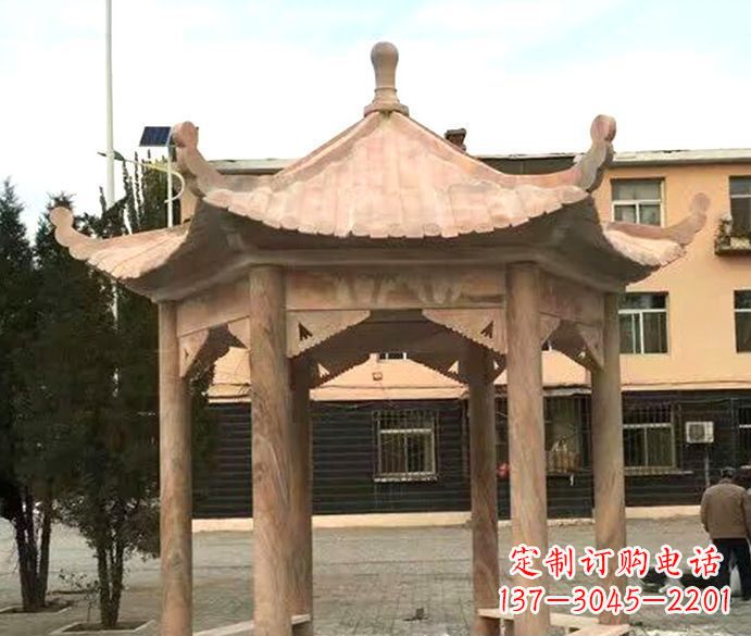 泉州园林晚霞红六角石雕凉亭